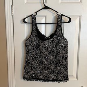 3/$10 Cato Sleeveless Top with beaded flowers and sparkles.